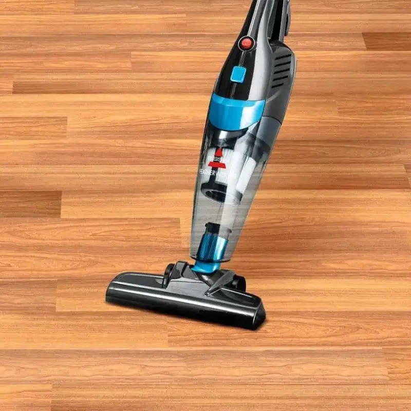 جاروشارژی ایستاده بیسل feather weight 2024E درحال جارو زدن پارکت