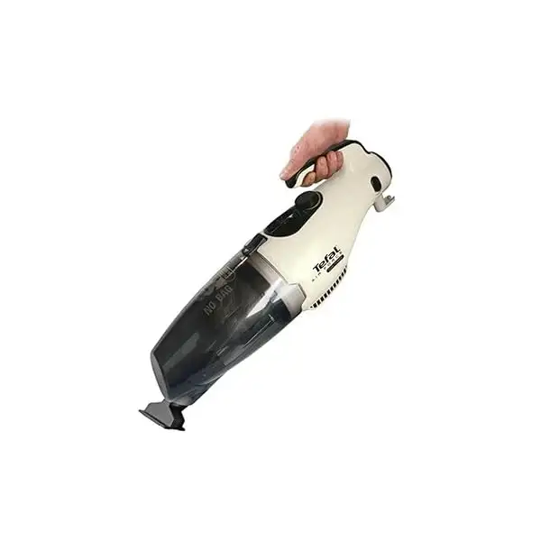 جاروبرقی عصایی و دستی تفال مدل UY5118 در دست یک مرد