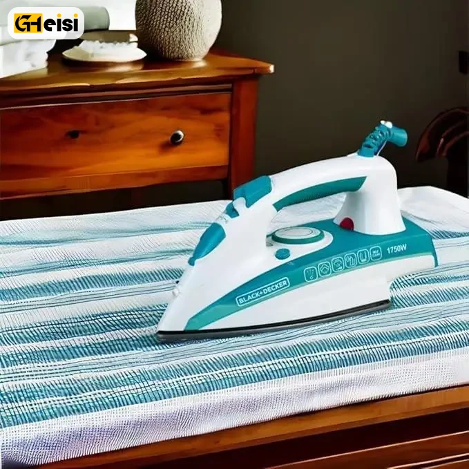 اتو بخار 1750 وات بلک اند دکر مدل X1600-B5 رنگ آبی سفید روی میز اتو روی یک پارچه دو رنگ
