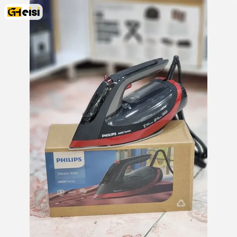 اتو بخار 2800 وات فیلیپس مدل DST6130 روی کارتون خاکی رنگش