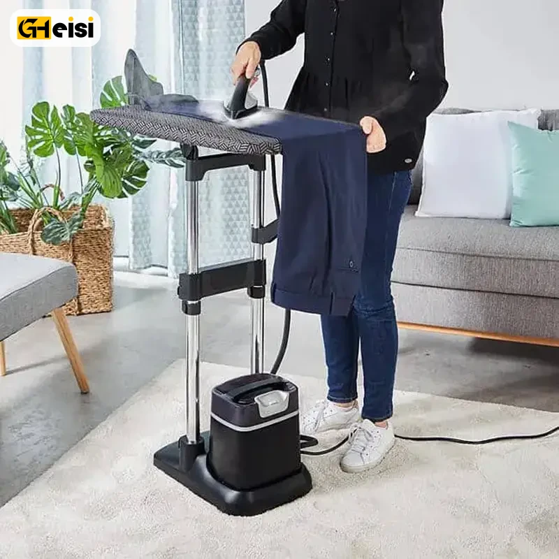 خانوم لباس را روی میز اتوی اتو بخارگر 2980 وات تفال مدل QT1510 G0 اتو میزند